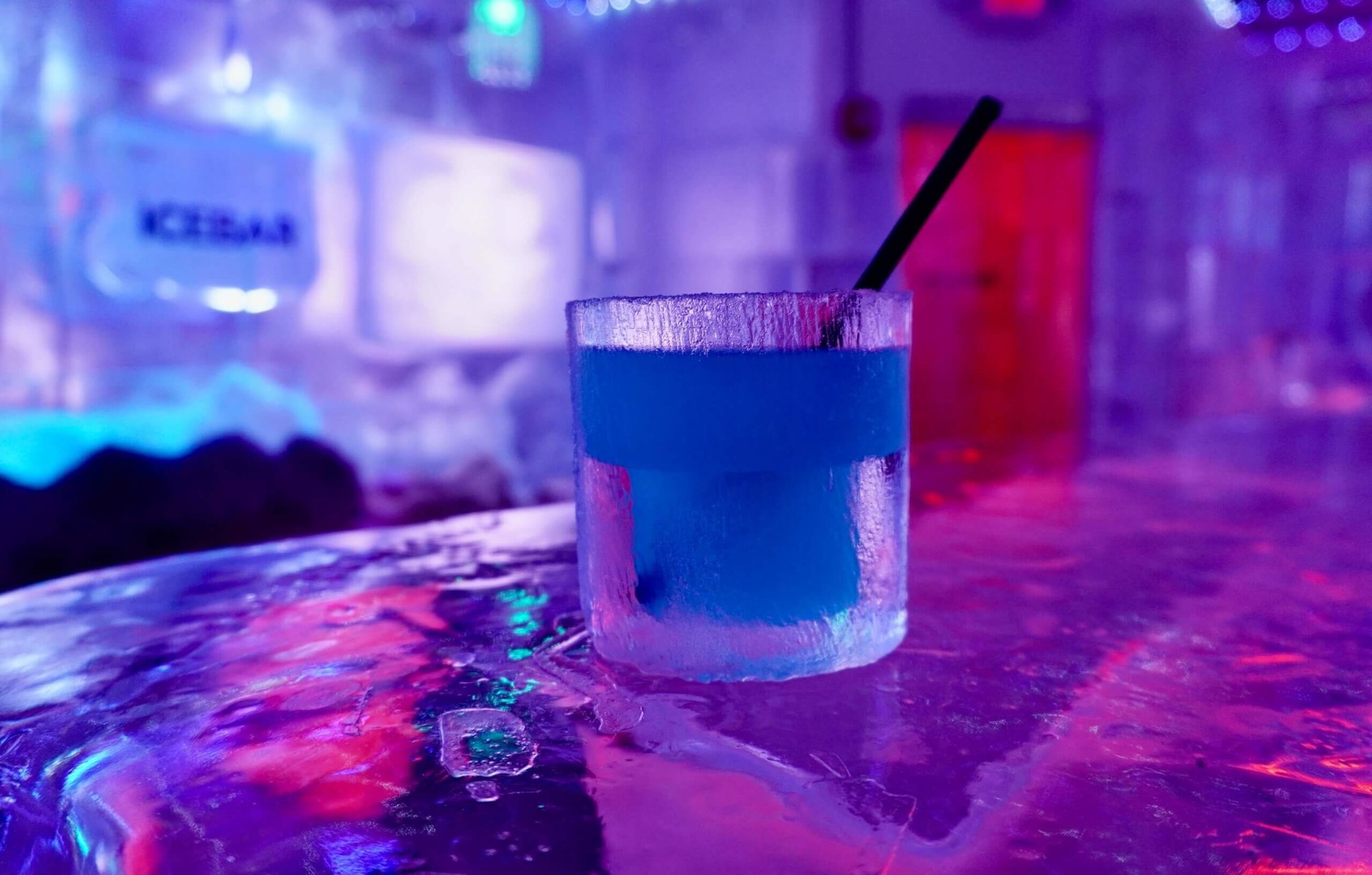 blue drink in an ice glass on ice counter